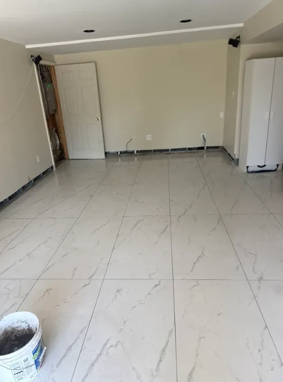 White marble-look tiled interior under construction