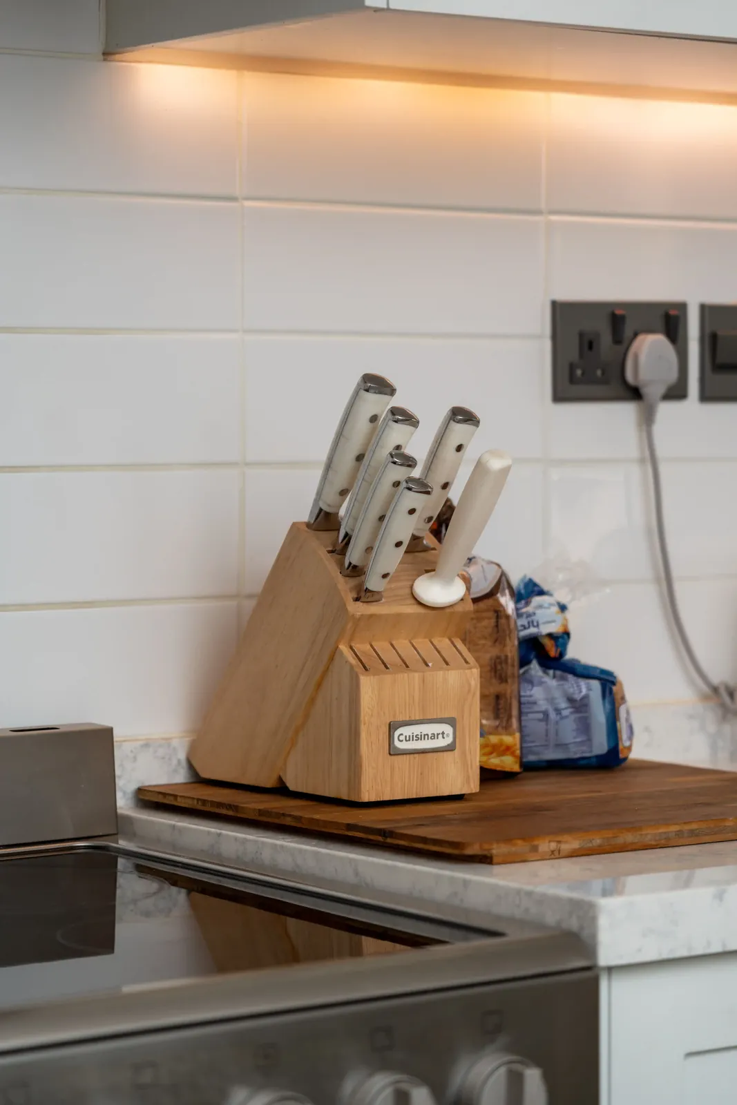 White rectangular tile kitchen backsplash